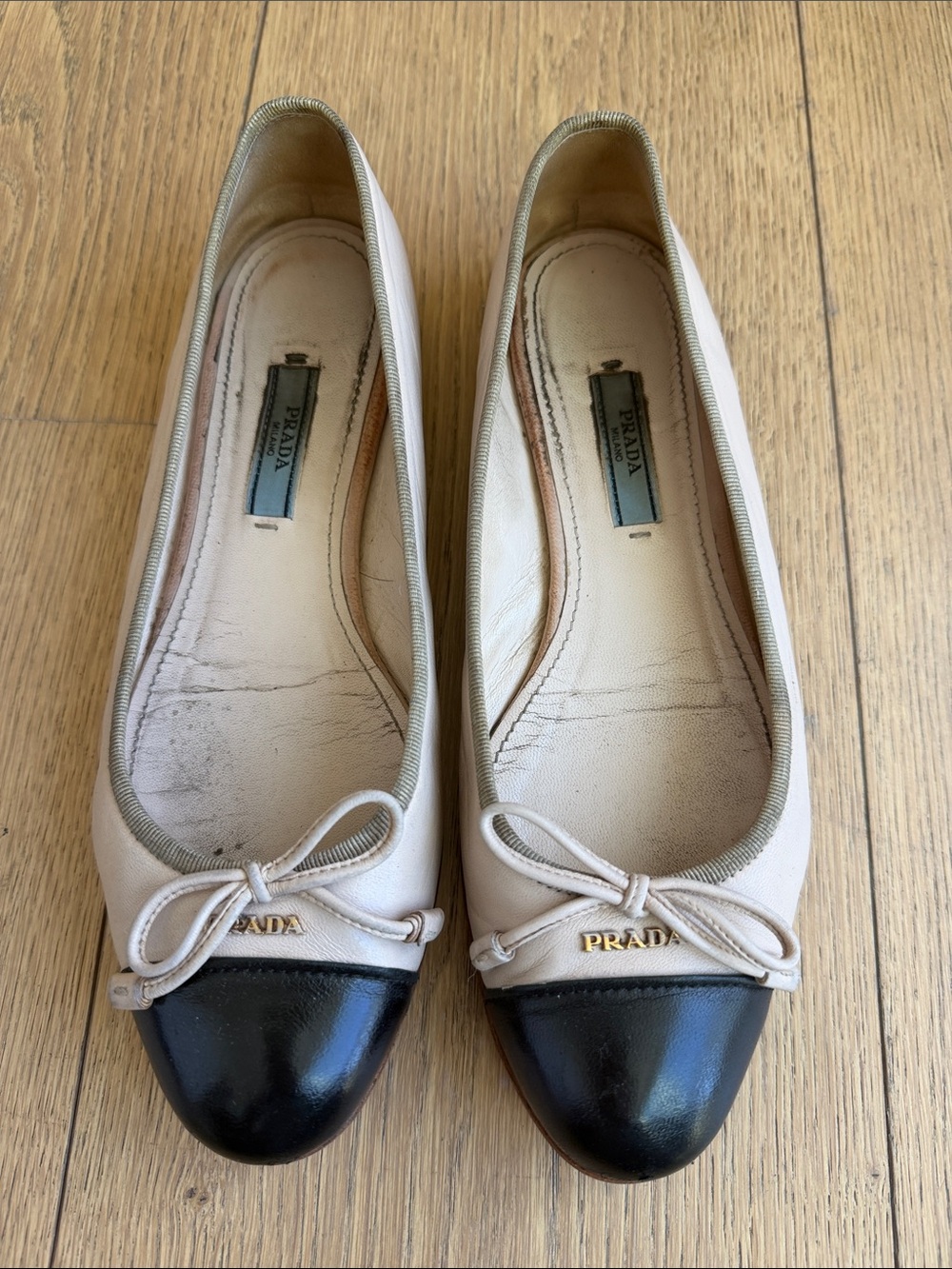 Prada Two-Tone Leather Ballet Flats in Cream and Black